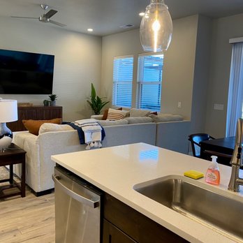Red Sands Vacation Properties - Living room and kitchen area. - Vacation Rentals Near Me - St. George, Utah Red Sands Vacation Properties - Living room and kitchen area. - Vacation Rentals Near Me - St. George, Utah