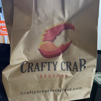 Crafty Crab - Bag, headless crab pot, and catfish with hush puppies. - Seafood Near Me - Charlotte, North Carolina