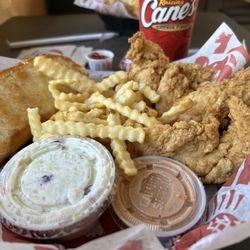 Raising Cane's Chicken Fingers - Chicken fingers, fries, coleslaw and Texas toast with dip