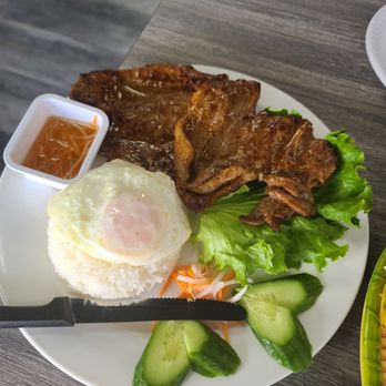 Pho Hello - Grilled marinated Pork chop with sunny side up egg - Asian Fusion Near Me - Huntington Beach, California Pho Hello - Grilled marinated Pork chop with sunny side up egg - Asian Fusion Near Me - Huntington Beach, California