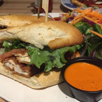 Boston Pizza - Buffalo Chicken Sandwich with sauce on the side and Greens - Pizza Near Me - Hamilton, Ontario Boston Pizza - Buffalo Chicken Sandwich with sauce on the side and Greens - Pizza Near Me - Hamilton, Ontario