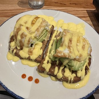 Table 55 - a plate of food on a table - New American Near Me - Miami, Florida