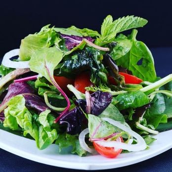 Arepas and Empanadas District - Our green salad - Caterers Near Me