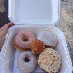 The Hole Donuts - Strawberry glaze, watermelon jelly filled, toasted coconut, and vegan lemon. The little guy is creme brûlée. They are all delicious !