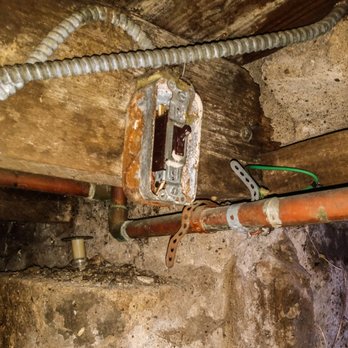 Q Home Inspections - Opened and rusted electrical switch box. - Home Inspectors Near Me Q Home Inspections - Opened and rusted electrical switch box. - Home Inspectors Near Me