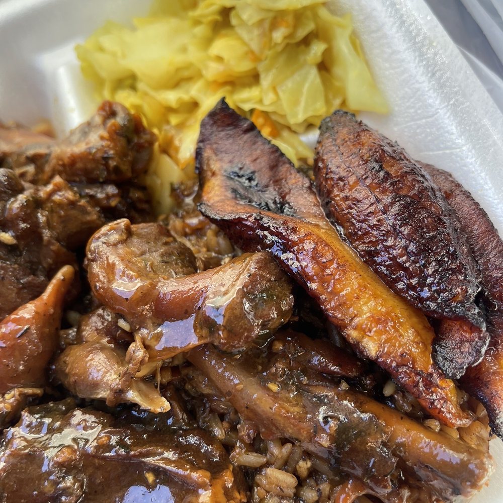 Island Kitchen - meat and rice in a styrofoam container - Caribbean Near Me - Pensacola, Florida Island Kitchen - meat and rice in a styrofoam container - Caribbean Near Me - Pensacola, Florida