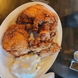 Chicken and mashed potatoes. Chicken and mashed potatoes.