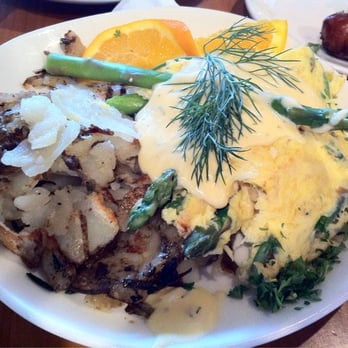 Plums Cafe - Crab omelet split in half - Breakfast & Brunch Near Me - Costa Mesa, California