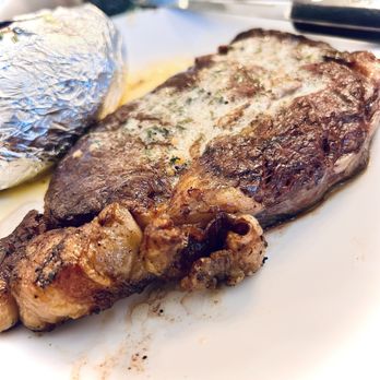 General Denver - Ribeye steak with a side of baked potato - Hotels Near Me - Wilmington, Ohio General Denver - Ribeye steak with a side of baked potato - Hotels Near Me - Wilmington, Ohio