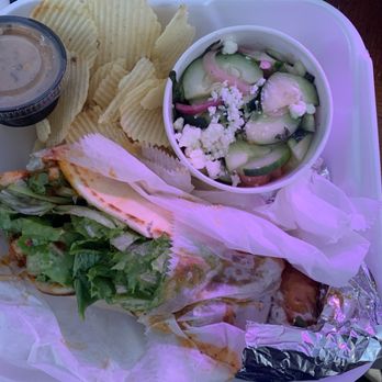 Taziki's Mediterranean Cafe - Mobile - Spicy Harissa Gyro, tomato Side of Tomato-Cucumber Salad, Side of Chips. - Mediterranean Near Me - Mobile, Alabama
