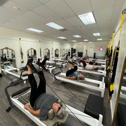 In Balance Pilates Oro Valley - Feet in straps