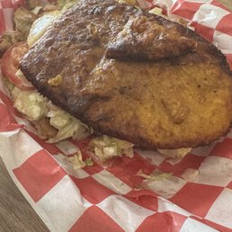 Yellow chicken tenderloin patacon Yellow chicken tenderloin patacon