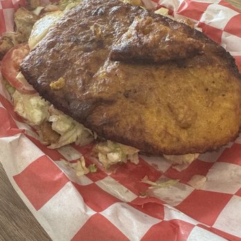 Nesticos - Yellow chicken tenderloin patacon - Venezuelan Near Me - Orlando, Florida Nesticos - Yellow chicken tenderloin patacon - Venezuelan Near Me - Orlando, Florida