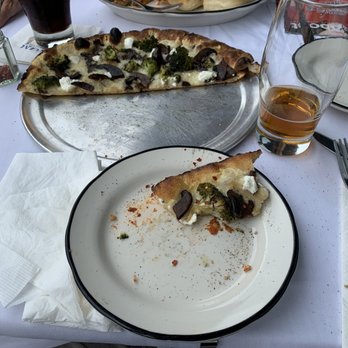 Taverna - Crimini mushroom, broccoli, and goat cheese pizza. - Italian Near Me - Wilmington, Delaware Taverna - Crimini mushroom, broccoli, and goat cheese pizza. - Italian Near Me - Wilmington, Delaware