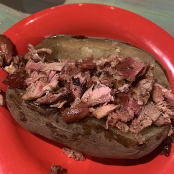 Pit Row Pit Stop - Rib meat colossal stuff baked potato - topping to be added later. Rib meat was very good, nice and tender. - Diners Near Me - Livingston, Texas