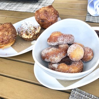 Riverpark - Pastry board Cinnamon Doughnuts - New American Near Me - New York, New York Riverpark - Pastry board Cinnamon Doughnuts - New American Near Me - New York, New York