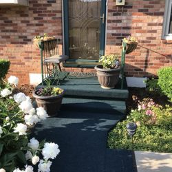 Clark Concrete - The old, carpeted, narrow and crumbling landing, steps and walkway