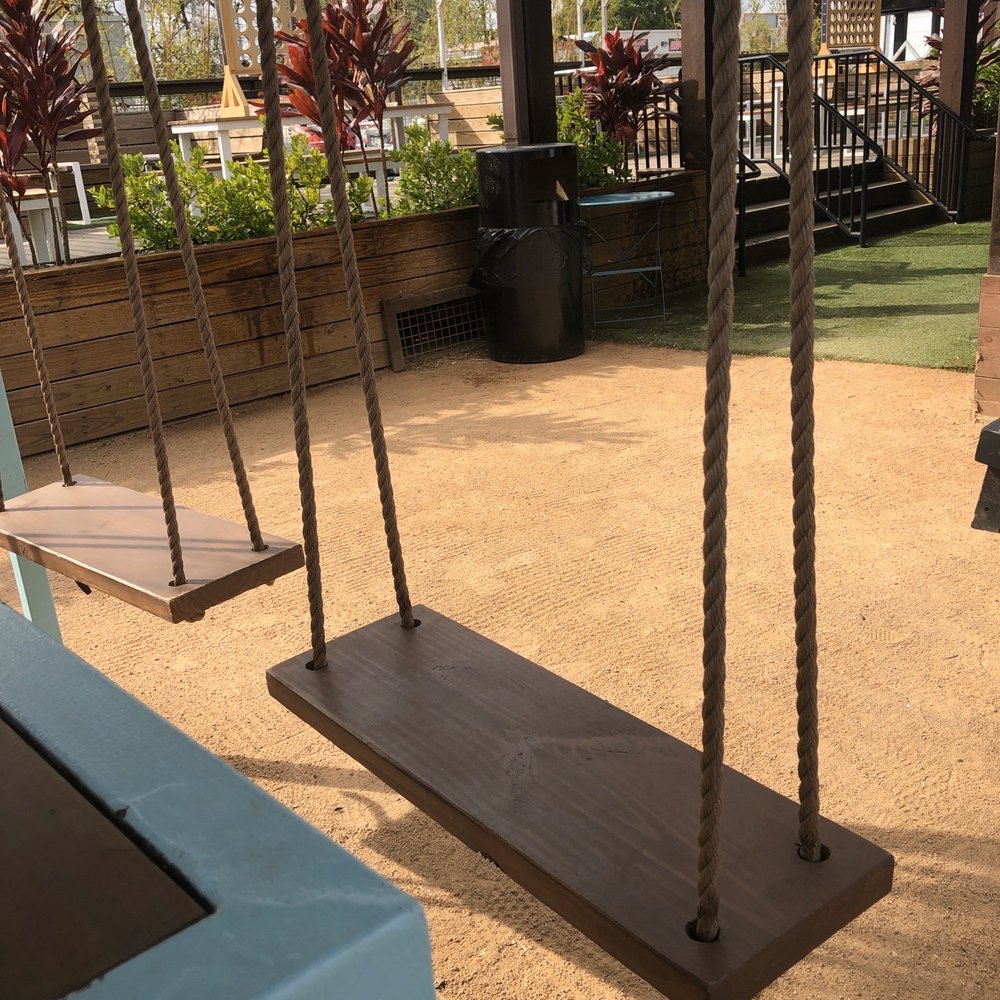 Tikila’s - Table for 8 with SWINGS!!! - Cocktail Bars Near Me - Houston, Texas Tikila’s - Table for 8 with SWINGS!!! - Cocktail Bars Near Me - Houston, Texas