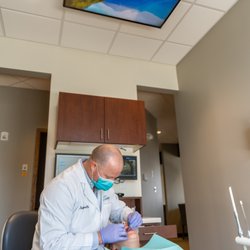 Twin Lakes Dental Care - We have ceiling TV's to enjoy your favorite shows while getting treatment.