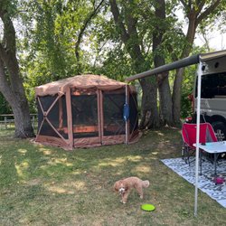 Crazy Horse Campground - River behind trees. Other sites have views of the river.