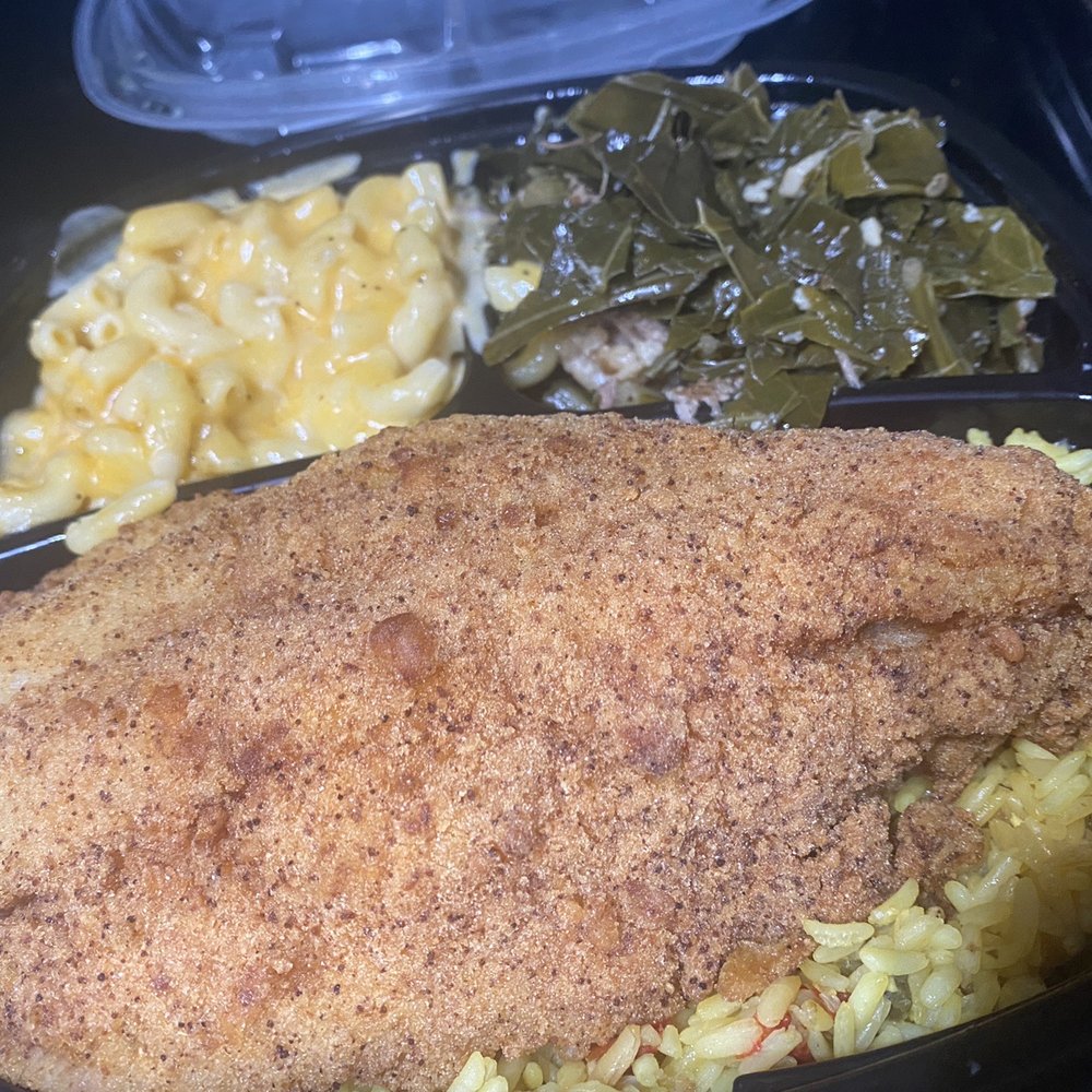 Soul Good - Catfish over yellow rice with greens and Mac and cheese. - Soul Food Near Me - Atlanta, Georgia Soul Good - Catfish over yellow rice with greens and Mac and cheese. - Soul Food Near Me - Atlanta, Georgia