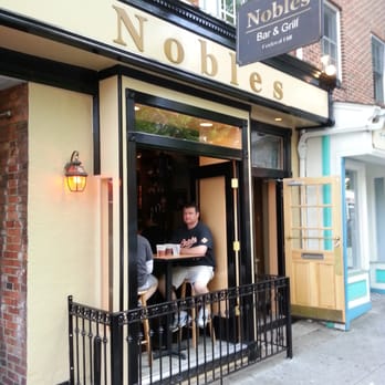 Nobles Bar And Grill - a man sitting at a table - Bars Near Me - Baltimore, Maryland Nobles Bar And Grill - a man sitting at a table - Bars Near Me - Baltimore, Maryland