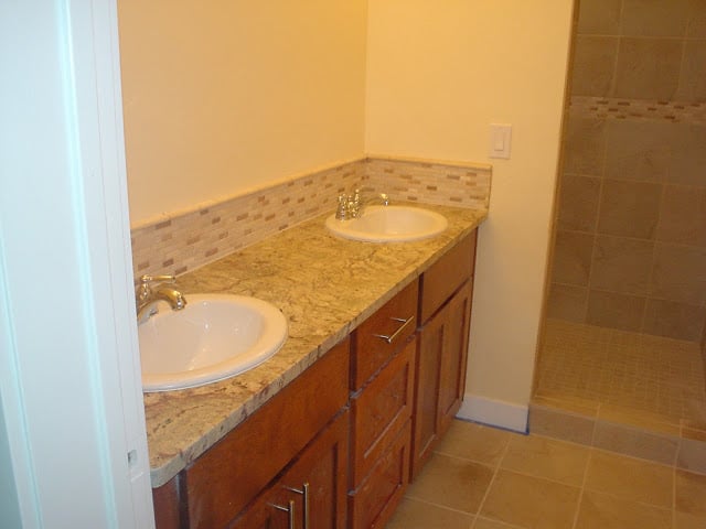 Slide of 2 Thumbs Up Plumbers & Remodelers