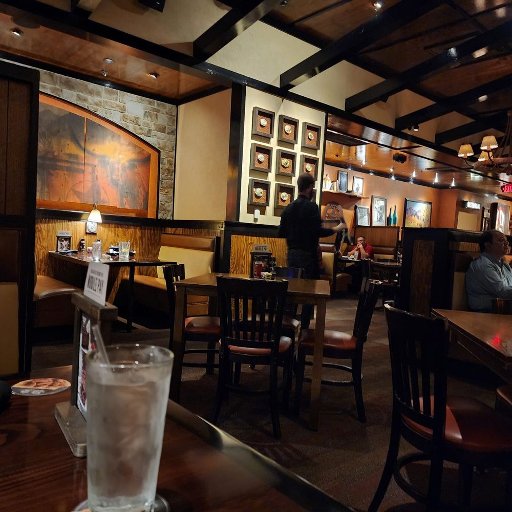 LongHorn Steakhouse - a glass of water on a table - Steakhouses Near Me - Plano, Texas LongHorn Steakhouse - a glass of water on a table - Steakhouses Near Me - Plano, Texas