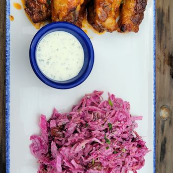 Kokomo Trading Company - Island chicken wings and Cole slaw , pretty tasty , the wings were good but could use a little heat to it. - New American Near Me - Franklin, Tennessee Kokomo Trading Company - Island chicken wings and Cole slaw , pretty tasty , the wings were good but could use a little heat to it. - New American Near Me - Franklin, Tennessee