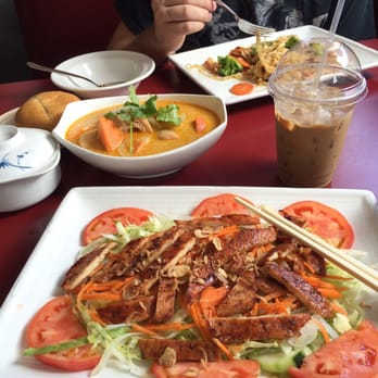 Pho 50 - Front: oriental salad with chicken, middle: chicken panang curry and Vietnamese iced coffee, back chicken lo mein. So delicious! - Vietnamese Near Me - Pueblo West, Colorado
