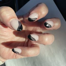 Different variation of a black tip French manicure Different variation of a black tip French manicure
