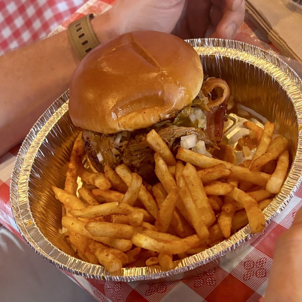 Smoke & Fire - Pulled pork burger and fries (which were really yummy and seasoned well) - Barbeque Near Me - Las Vegas, Nevada Smoke & Fire - Pulled pork burger and fries (which were really yummy and seasoned well) - Barbeque Near Me - Las Vegas, Nevada