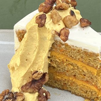 Golden Hour - The delicious carrot cake! The gold frosting includes curry! The layers include carrot jam!! - Bars Near Me - Asheville, North Carolina Golden Hour - The delicious carrot cake! The gold frosting includes curry! The layers include carrot jam!! - Bars Near Me - Asheville, North Carolina