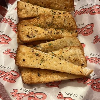 Buca di Beppo Italian Restaurant - Garlic Bread - Italian Near Me - Santa Clarita, California Buca di Beppo Italian Restaurant - Garlic Bread - Italian Near Me - Santa Clarita, California