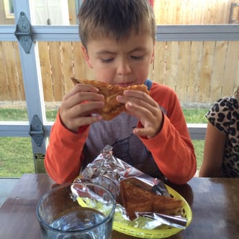 Bend Burgz N Dogz - Not much cheese, but he still ate it. - Hot Dogs Near Me - Bend, Oregon