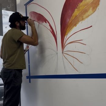 Surfside Murals - Colorful Butterfly business commercials mural for a store - Painters Near Me