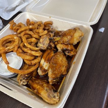 It’s Just Wings - a tray of fried wings and onion rings - Chicken Wings Near Me - Southern Pines, North Carolina It’s Just Wings - a tray of fried wings and onion rings - Chicken Wings Near Me - Southern Pines, North Carolina