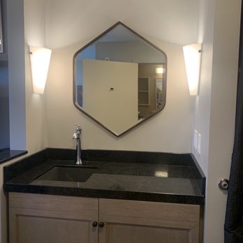 Mediterranean Inn - Wet bar area with microwave and mini fridge in cabinets below - Hotels Near Me - Seattle, Washington Mediterranean Inn - Wet bar area with microwave and mini fridge in cabinets below - Hotels Near Me - Seattle, Washington