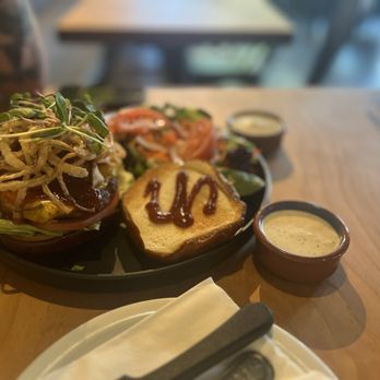 Buddha Belly Burger - BBQ bacon burger with side of ranch. - Salad Near Me - Sacramento, California Buddha Belly Burger - BBQ bacon burger with side of ranch. - Salad Near Me - Sacramento, California
