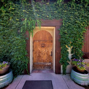 Wilderotter Vineyard - Entrance with vines growing around old door - Wineries Near Me - Plymouth, California Wilderotter Vineyard - Entrance with vines growing around old door - Wineries Near Me - Plymouth, California