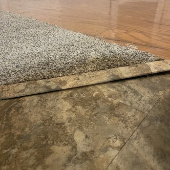 America Flooring Systems - a closeup of a carpet on the floor - Flooring Near Me - Stockbridge, Georgia
