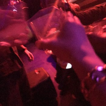 Whiskey Disco - a person holding a glass of wine - Dance Clubs Near Me - Detroit, Michigan Whiskey Disco - a person holding a glass of wine - Dance Clubs Near Me - Detroit, Michigan