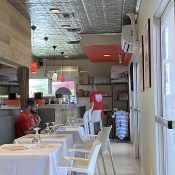 Chicken Ranch - Another part of their indoor/patio seating. It was kind of divided in two. Love the white tablecloths and the chairs. - Chicken Shop Near Me - Palm Springs, California Chicken Ranch - Another part of their indoor/patio seating. It was kind of divided in two. Love the white tablecloths and the chairs. - Chicken Shop Near Me - Palm Springs, California
