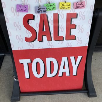Just Between Us Consignment - Sign out side on sidewalk - Used, Vintage & Consignment Near Me - Austin, Texas