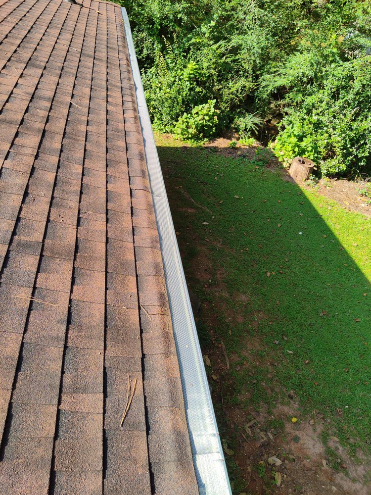 Slide of Julio's Gutter Guards and Cleaning