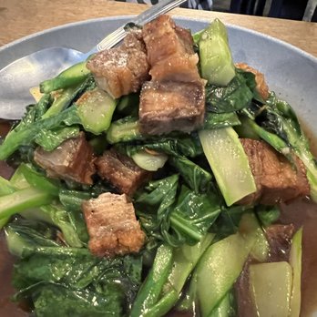 Bai Bua Thai Cuisine - Kai Lan with crispy pork - Thai Near Me - Vancouver, British Columbia Bai Bua Thai Cuisine - Kai Lan with crispy pork - Thai Near Me - Vancouver, British Columbia