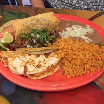 La Parada - #22! Quesadilla, taco and enchilada with rice and beans. $8.99 - Mexican Near Me - Indianapolis, Indiana La Parada - #22! Quesadilla, taco and enchilada with rice and beans. $8.99 - Mexican Near Me - Indianapolis, Indiana