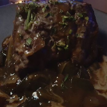 Blue Note Hawaii - Braised short rib with collared greens and polenta. - Music Venues Near Me - Honolulu, Hawaii