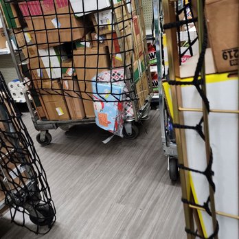 Dollar General - a pile of boxes in a store - Discount Store Near Me - Irvington, New Jersey