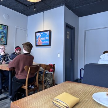 Fireroast Coffee - a group of people sitting at a table - Coffee & Tea Near Me - Minneapolis, Minnesota Fireroast Coffee - a group of people sitting at a table - Coffee & Tea Near Me - Minneapolis, Minnesota